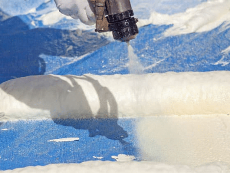 Spraying on a roof coating in phoenix az