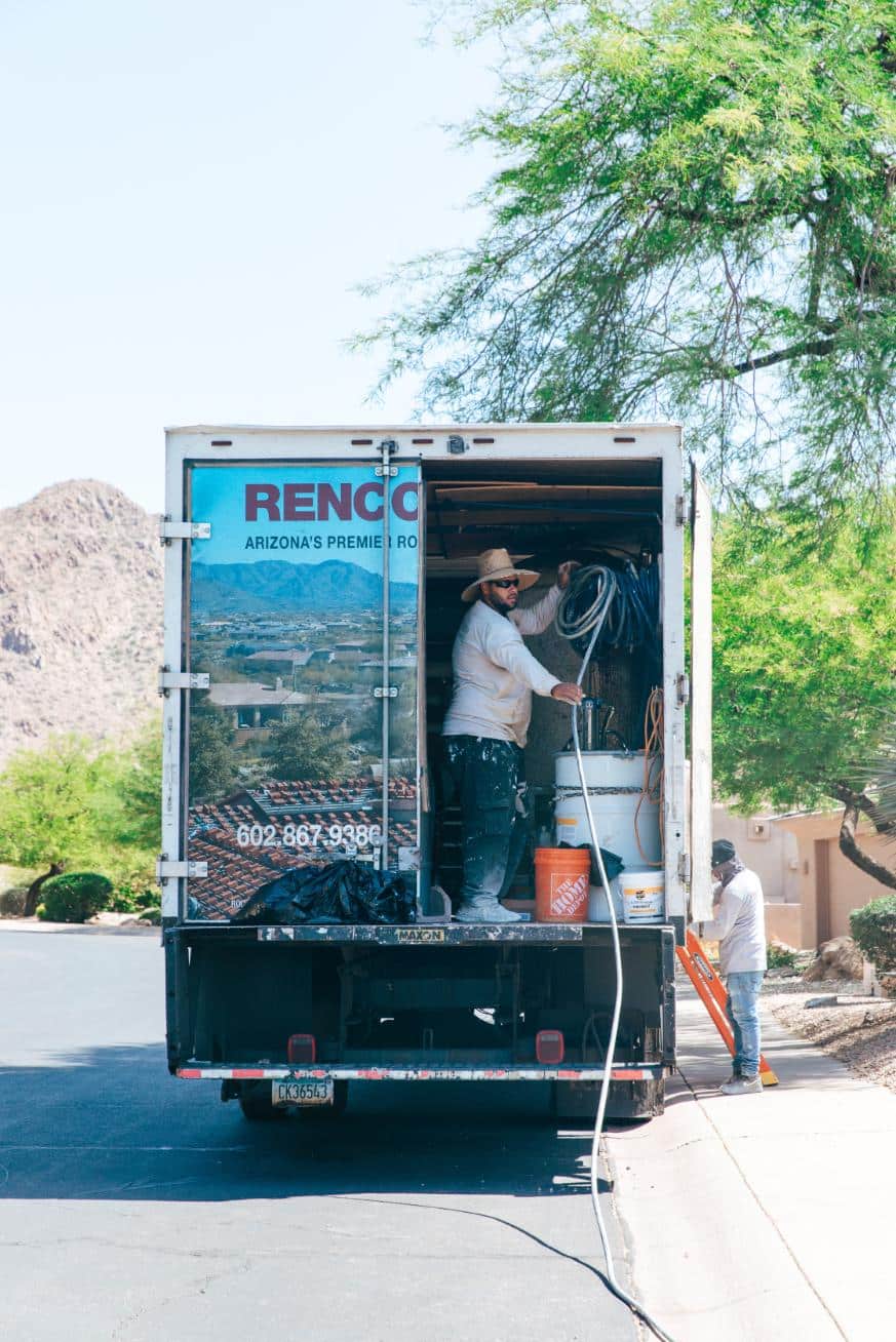 RENCO Workers Loading Box Truck