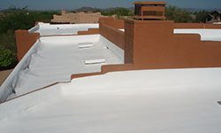 White Foam Roof on Adobe House