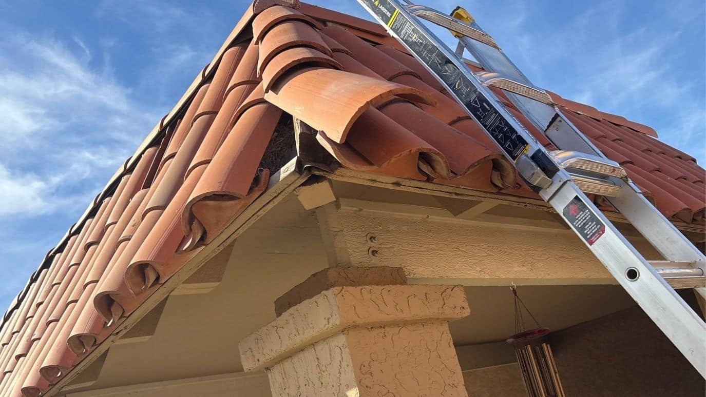 Damaged tile roof flashing in Phoenix
