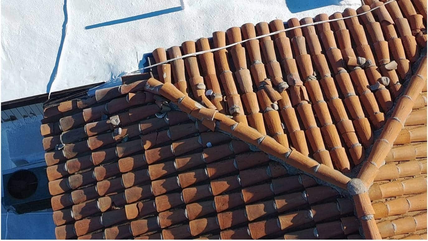Broken tile roof in Phoenix repaired by RENCO Roofing