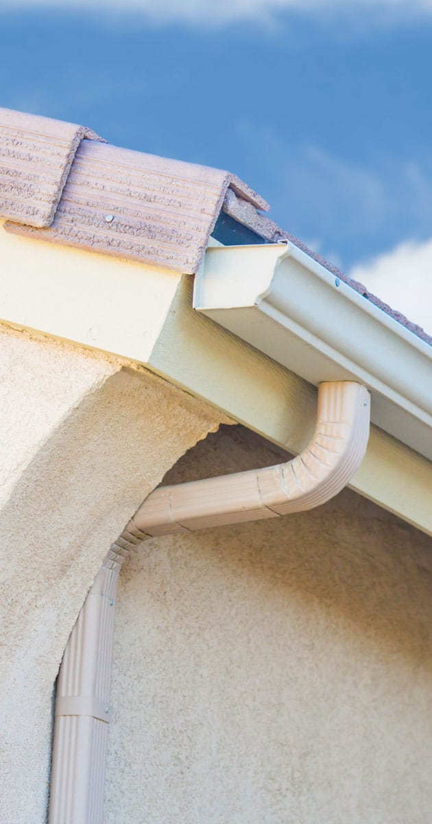 Avondale house with white gutter system