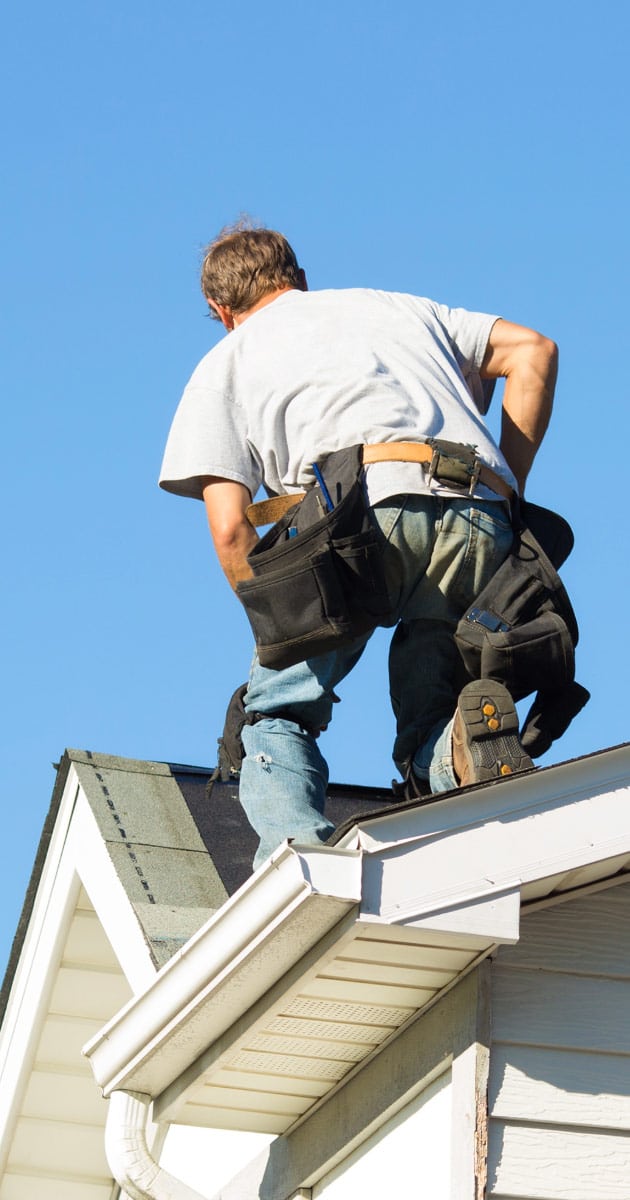 Roofer working on a house in Avondale AZ